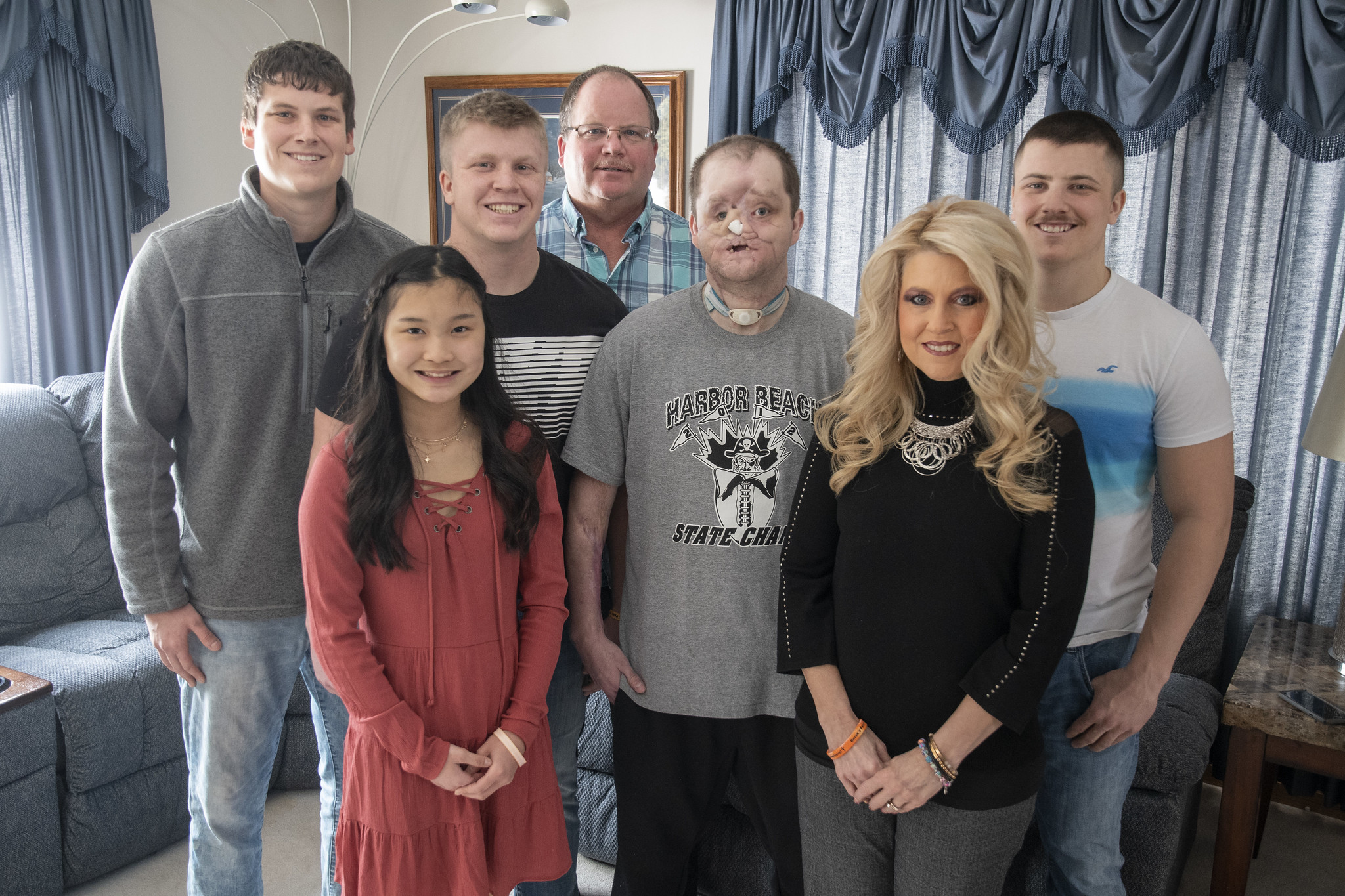 The Pfaff family pose for a photo in their Harbor Beach home.