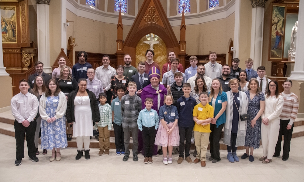 Elect welcomed into full communion with the Catholic Church at the Easter Vigil 2