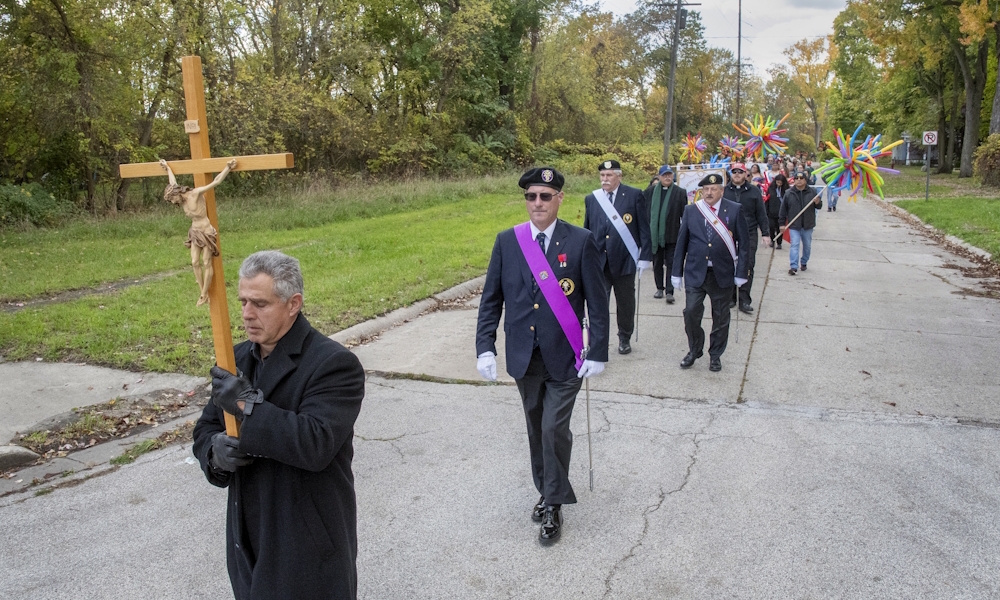 Hundreds join march in solidarity with migrants and refugees