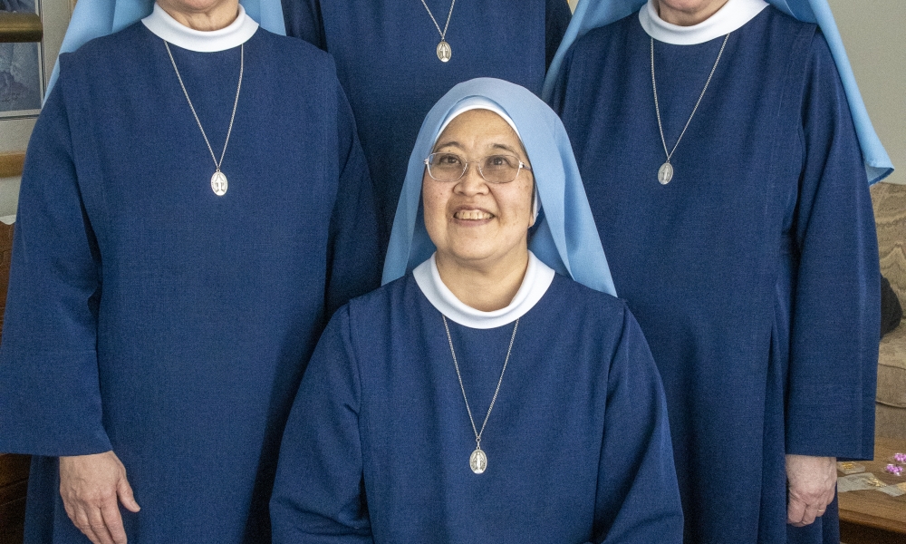 Four religious sisters in their convent